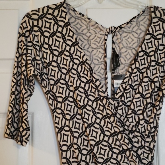 BCBGMaxAzria Dresses & Skirts - BCBG Black & Cream geo-print faux wrap dress